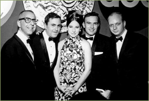 Presenter Barbra Streisand poses backstage with the winners of the 1967 Tony Award for best musical, Cabaret: (from left) librettist Joe Masteroff, composer John Kander, lyricist Fred Ebb, and producer Harold Prince. Photo by: ABC, Inc